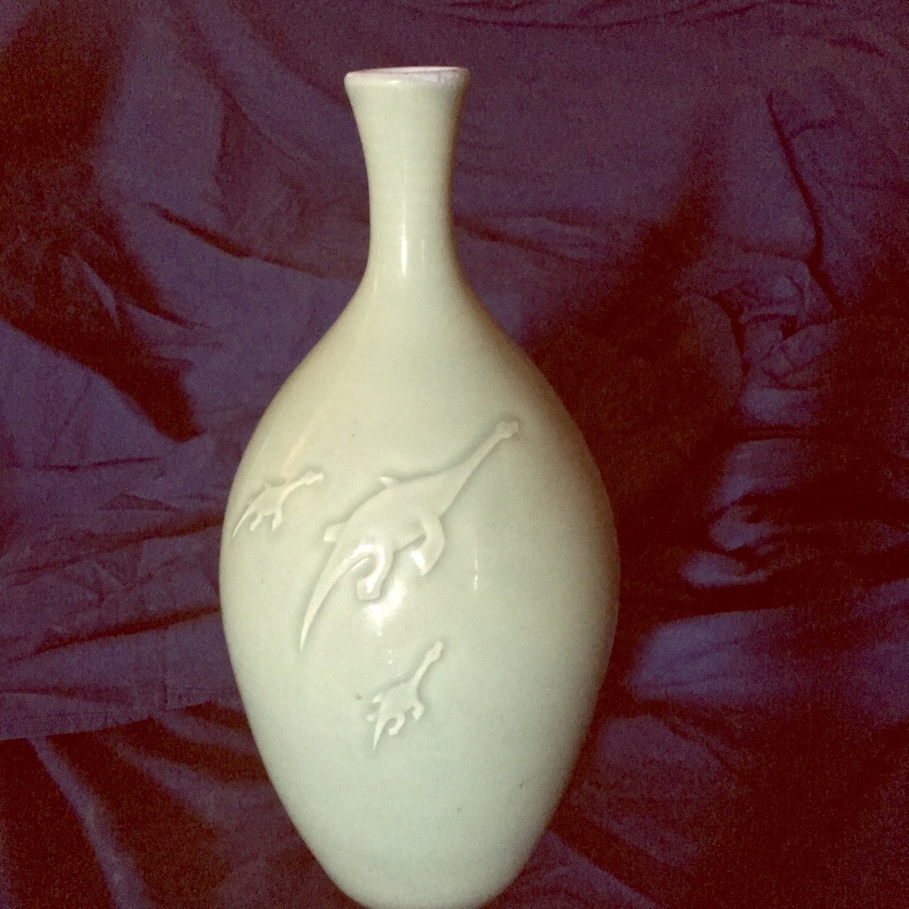 My original 1.5ft. tall dinosaurs bottle porcelain